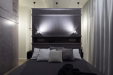 07 The darker accents allow the bedroom and bathroom to feel particularly relaxing and comfortable
