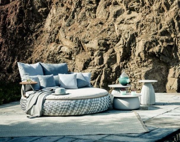 comfy round seating with a table and done in sea-inspired shades
