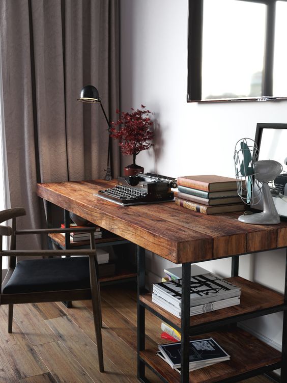 a cool dark stained industrial desk with blackened metal and shelves