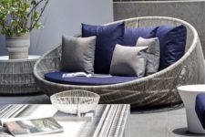 09 grey wicker love seat with navy cushions look great together