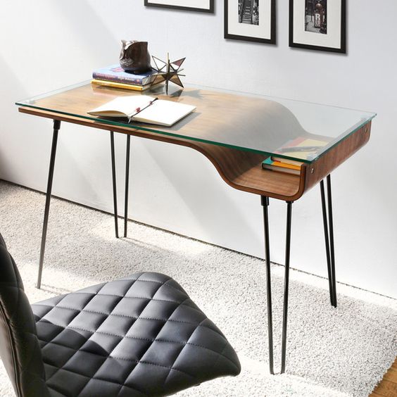 minimalist desk with a glass top and a storage spaace underneath