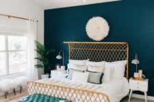 19 a woven gilded metal bed with a bent headboard looks chic