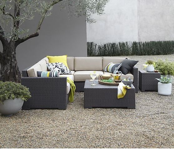 Arholma sectional sofa with some table and bold pillows is great for any backyard