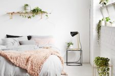 24 lots of plants here make the bedroom fresh and lively