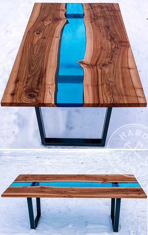 beautiful dining table made of wooden slabs Elm with the live edges and of the glass with a blue color