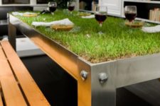 27 a metal dining table with grass growing will easily turn your meal into a picnic