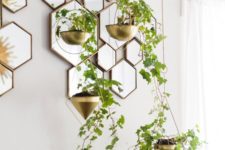 31 small gilded planters add a refined feel to the bedroom
