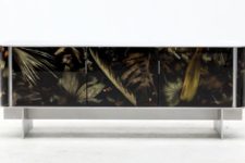 01 The console from Floral Noir collection has neutral framing and a gorgeous leaves in resin
