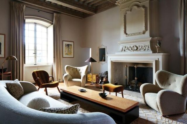 This beautiful French chateau was restored and furnished with cool designer items to create a chic and refined yet very modern ambience