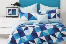 02 bold blue, navy and white triangle print bedding for a seaside space