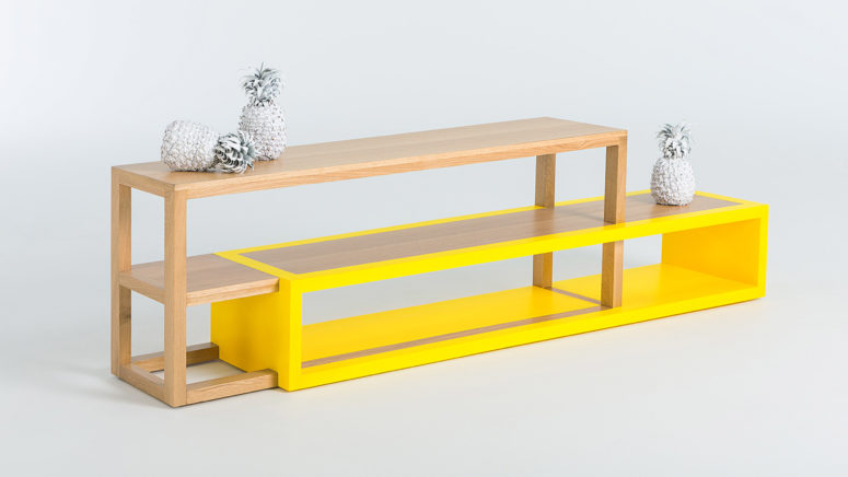 The media console creates an illusion of objects in motion thanks to the unique bold yellow part