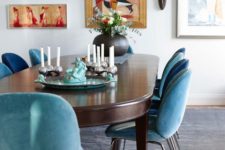 04 blue and turquoise upholstered chairs create a mood in this dining room