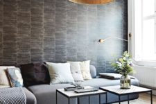 05 The living room is another space with an eye-catchy wallpaper wall, and this one imitates chocolate wood planks