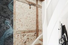06 Original wooden beams and brick walls are preserved to give the space a character and make it more interesting