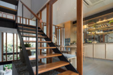07 I totally love the idea of a modern blackened steel and warm-colored wood staircase and pebbles under it for a natural feel