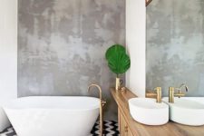 bathroom with a concrete wall