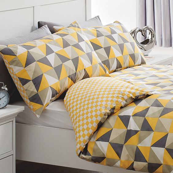 grey, black, yellow, white and black triangle bedding for a sunny feel in your bedroom