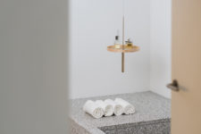 08 The circulum ceiling shelf used in the bathroom in white marble
