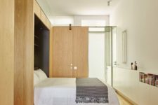 09 There’s another bedroom with a folding bed, almost fully clad with oak wood for comfort