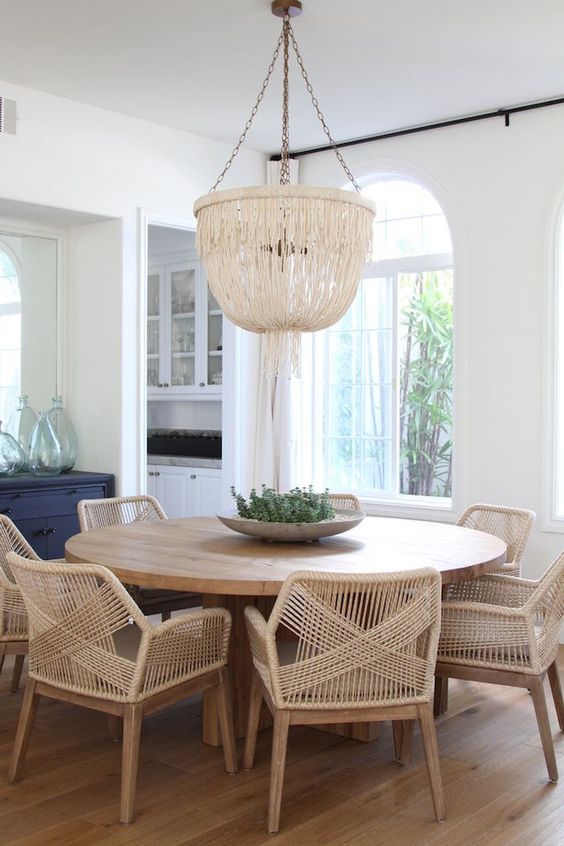 wicker chairs will make the dining space cozier and more inviting