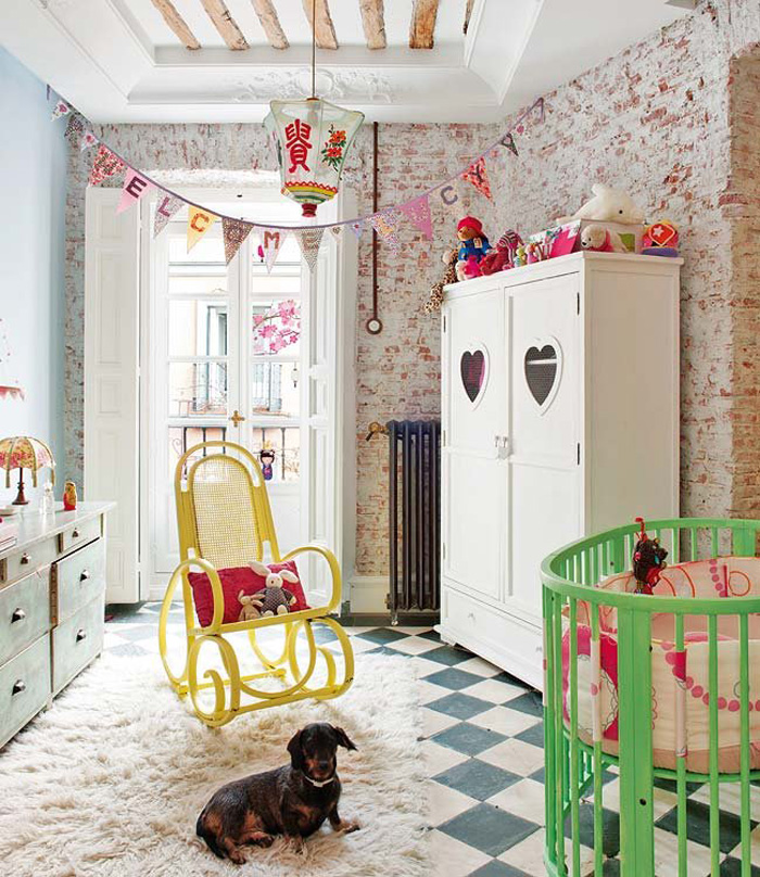 The kids room has also original stone walls, beams and fun and colorful furniture