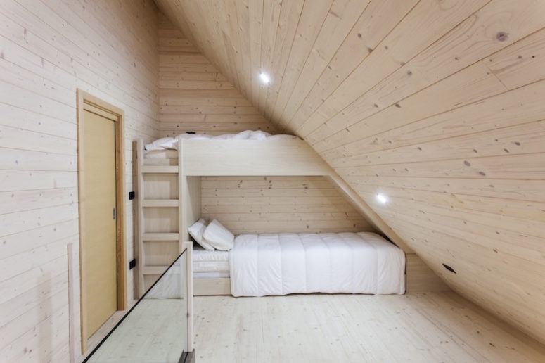 There's an attic sleeping area to fit under the roof, it's difficult to imagine a space cozier than that