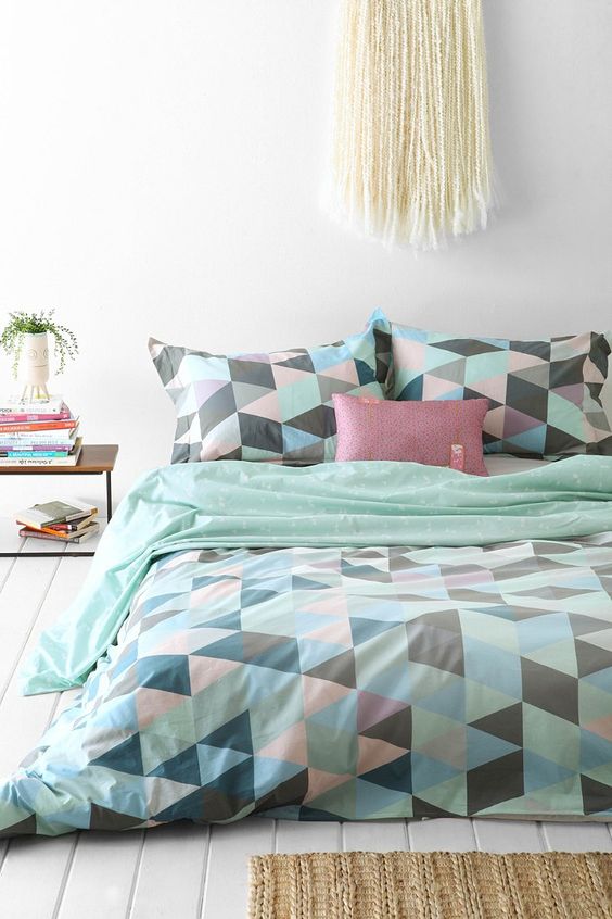 mint, green, blush, black triangle print bedding is ideal for spring and summer