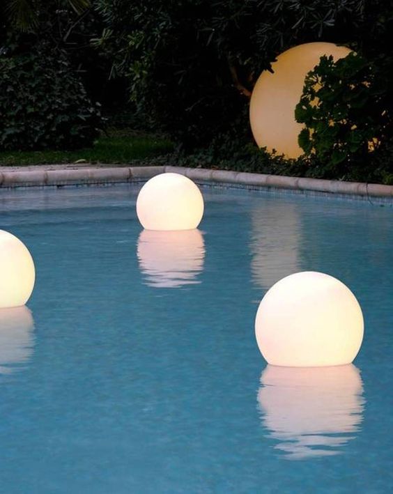 floating, waterproof LED globes for lighting up the pool, and you can swim with them