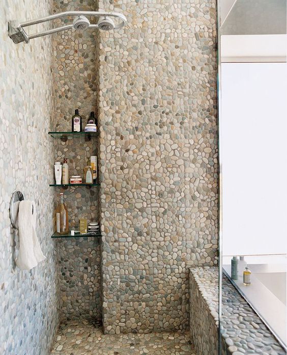 tiles imitating river pebbles will give your bathoom a soothing natural feel