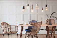 14 a combo of industrial bulbs over the dining space catches an eye