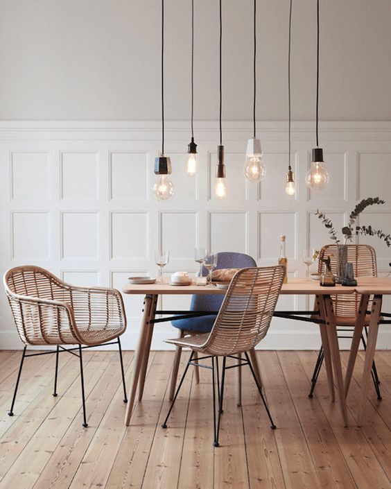 a combo of industrial bulbs over the dining space catches an eye