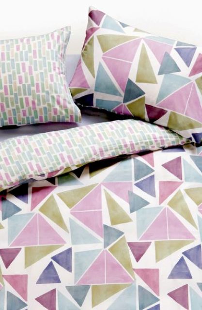 watercolor colorful chaotic triangle bedding for a more creative look