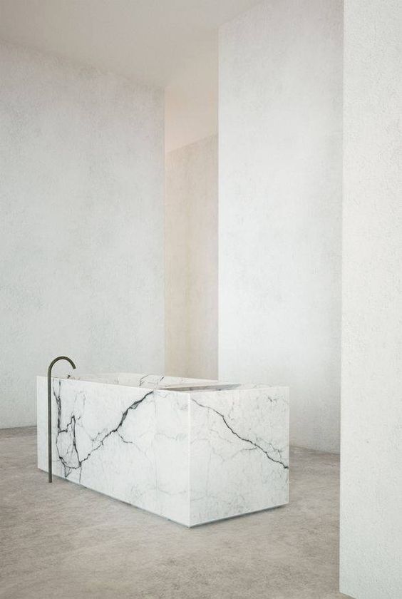 a statement square marble tub is a luxurious piece, which is enough to make your space gorgeous