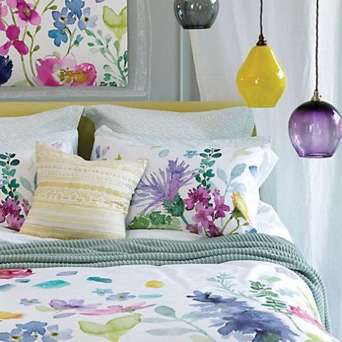delicate watercolor floral bedding with different blooms