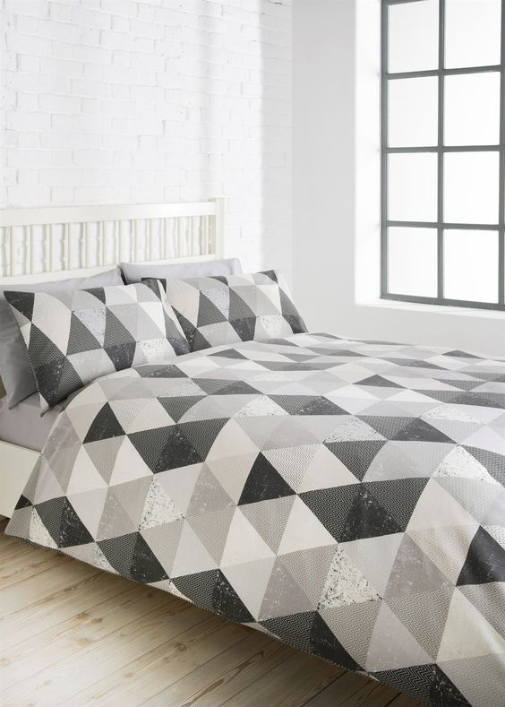 white and shades of grey geometric bedding for a peaceful feel