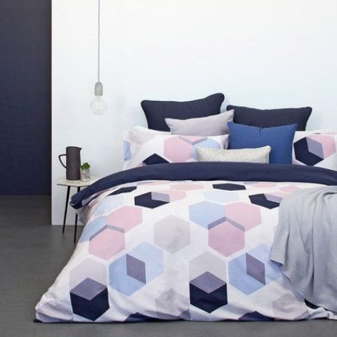 purple, pink and navy hexaagon print bedding will make your space fresh