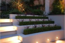 22 lights attached to the planters to illuminate the patio and steps