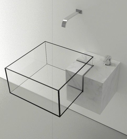 minimalist framed glass sink in a marble holder
