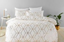 25 chic white bedding with geometric gold prints for an elegant and glam bedroom