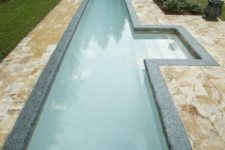 29 narrow pool with steps highlighted and clad with pebbles for a natural feel