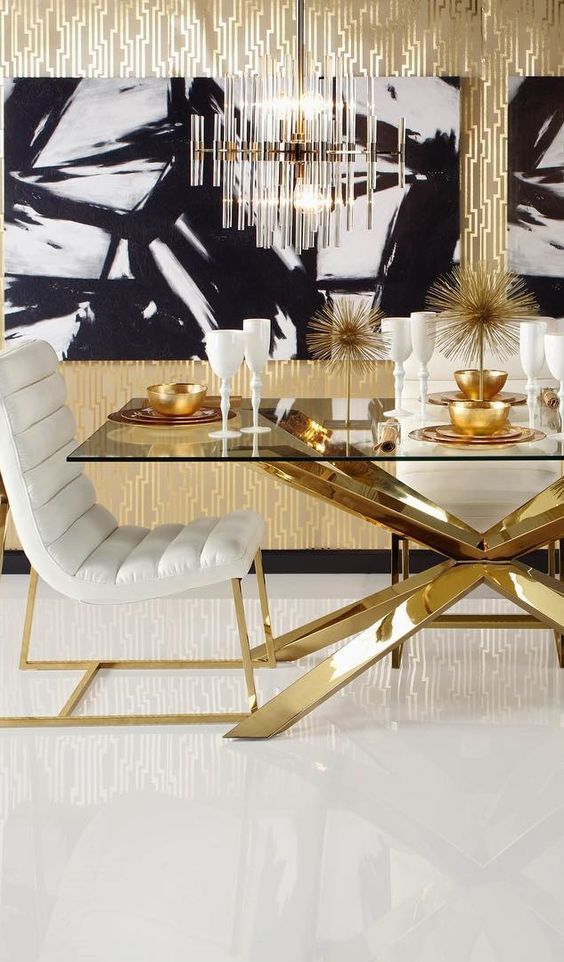 a black and white wall art makes the gold and white space calmer