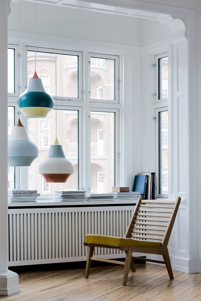 These are large hanging lamps with colorful stripes that are to raise your mood