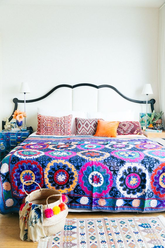 bold print bedspread and geo printed pillows to pair with