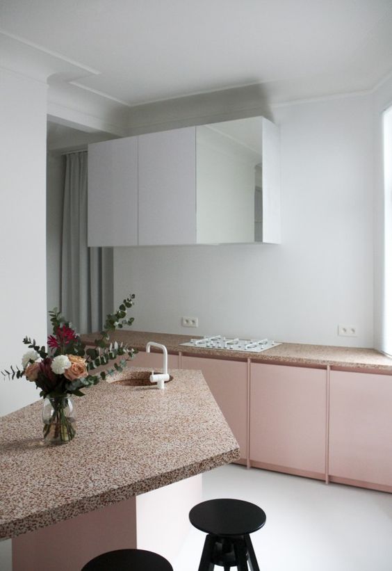 pink terrazzo countertops perfectly fit plain rose cabinets for a girlish kitchen