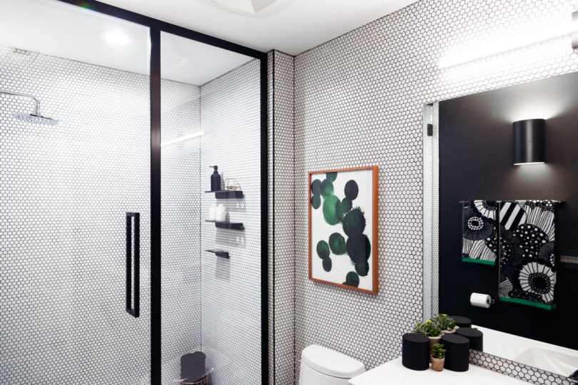I love the idea of white hexagon tiles with black grout and a black framed shower