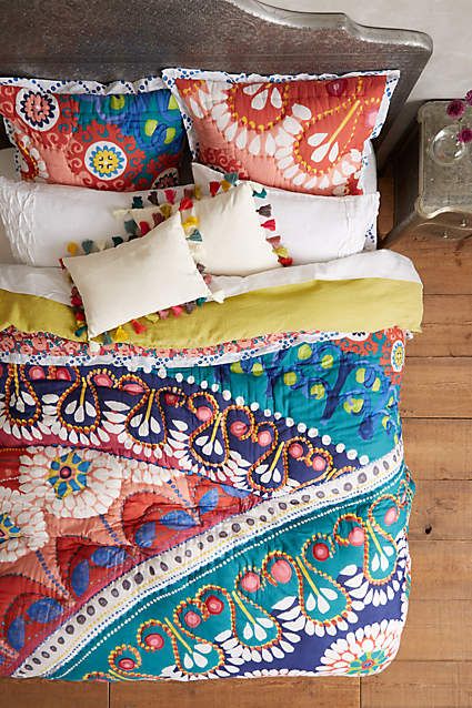 bold gypsy-inspired bedding with various prints and colors