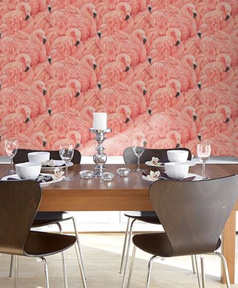 pink flamingo wallpaper make this modern dining space pop with color