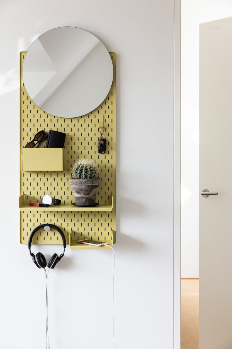 Frame is a colorful storage piece with a mirror, it's ideal for storing small things and accessories