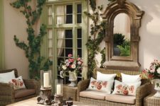 04 a patio that resembles a traditional living room with vintage touches and rustic furniture