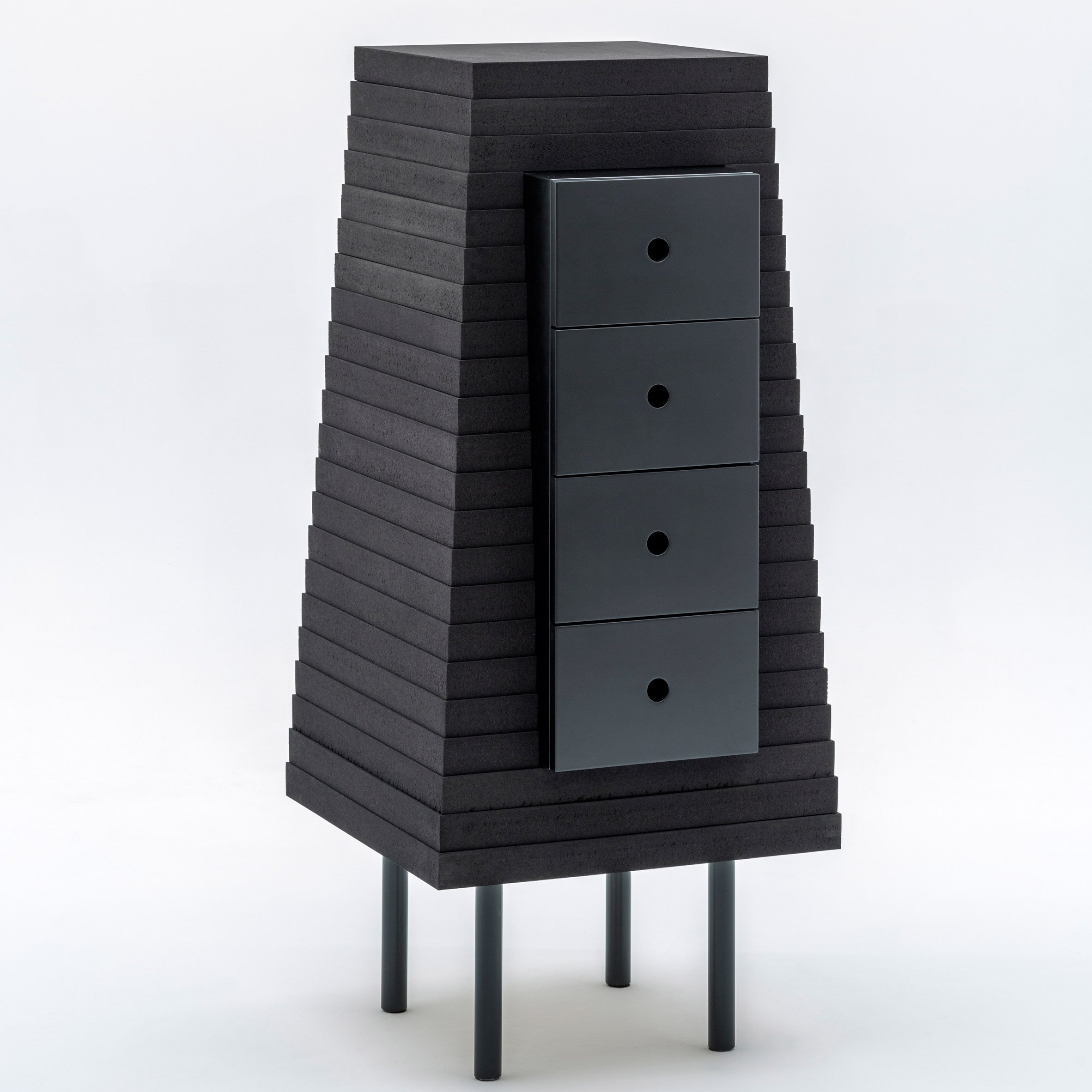 Piece D is a chest of drawers made from black cork
